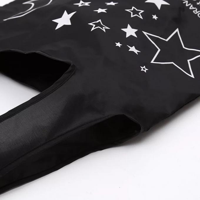Petits sacs personnalisés noirs de cadeau pour des affaires beaucoup d'étoiles sur la surface
