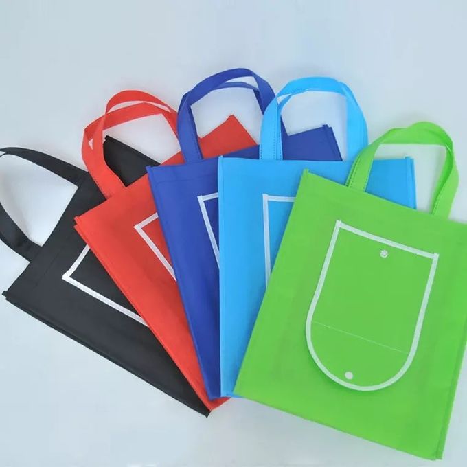 Les sacs à provisions réutilisables rouge-clair qui se plient dans eux-mêmes ont adapté le logo aux besoins du client